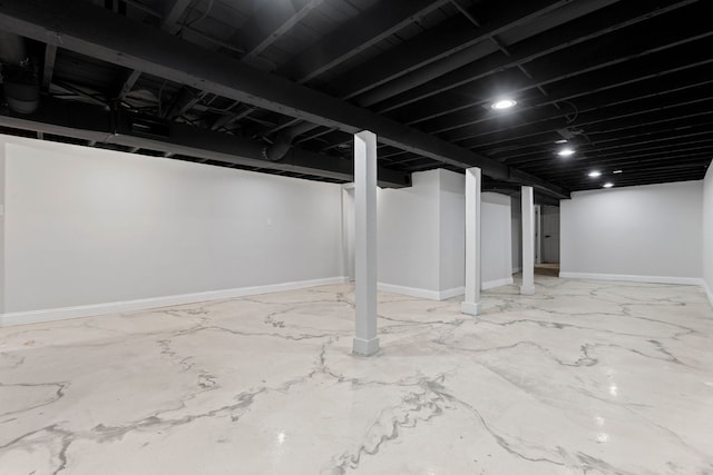 finished below grade area featuring baseboards