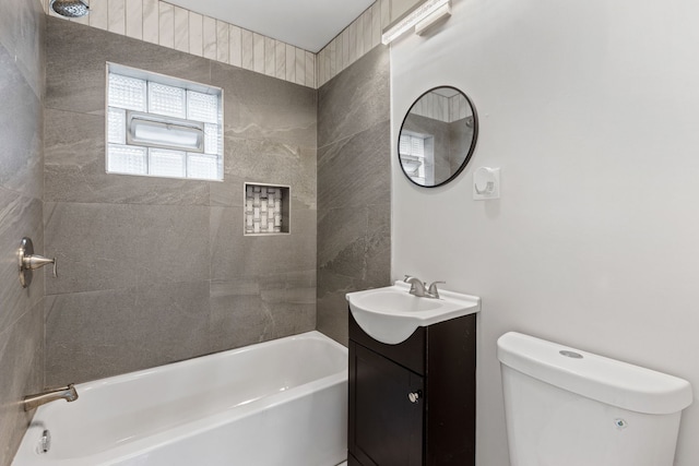 full bathroom featuring toilet, shower / bath combination, and vanity