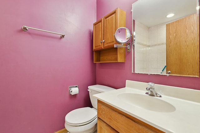 bathroom with vanity and toilet