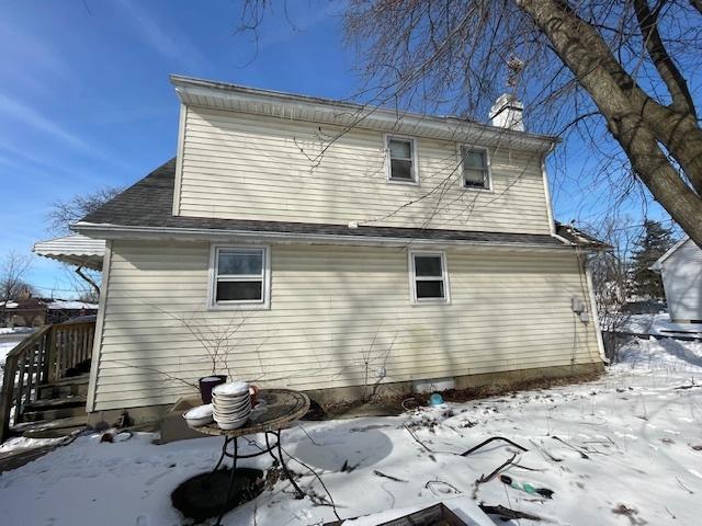 view of snow covered property