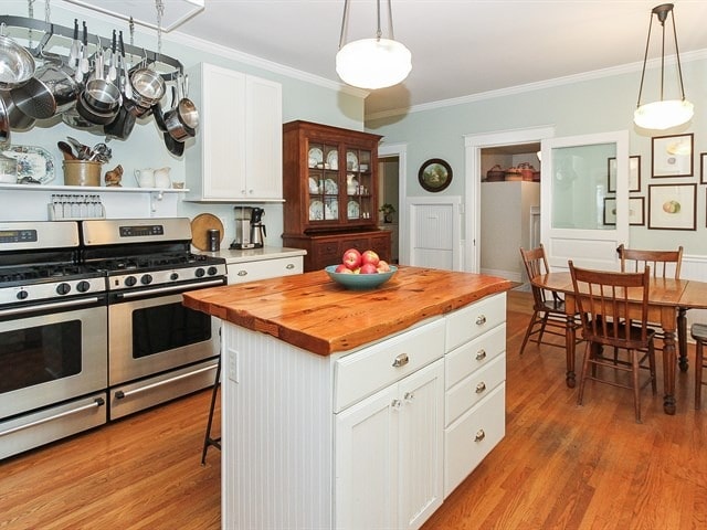 44W906 Berner Rd, Hampshire, IL 60140 - kitchen with light wood finished floors, butcher block countertops, and gas stove