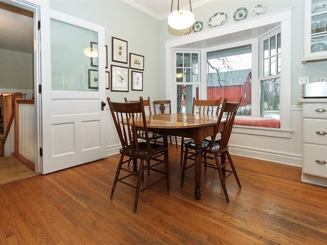 44W906 Berner Rd, Hampshire, IL 60140 - dining room featuring crown molding and wood finished floors