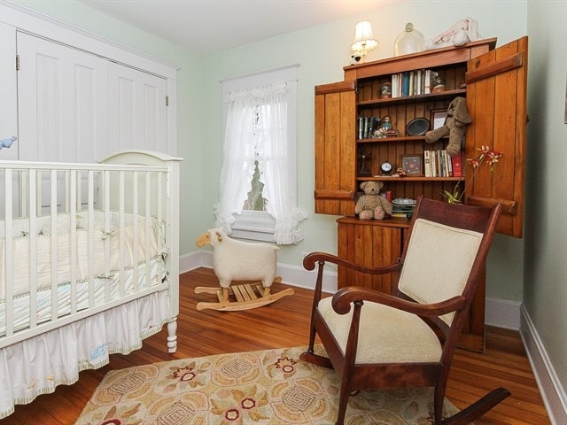 44W906 Berner Rd, Hampshire, IL 60140 - bedroom featuring baseboards and wood finished floors