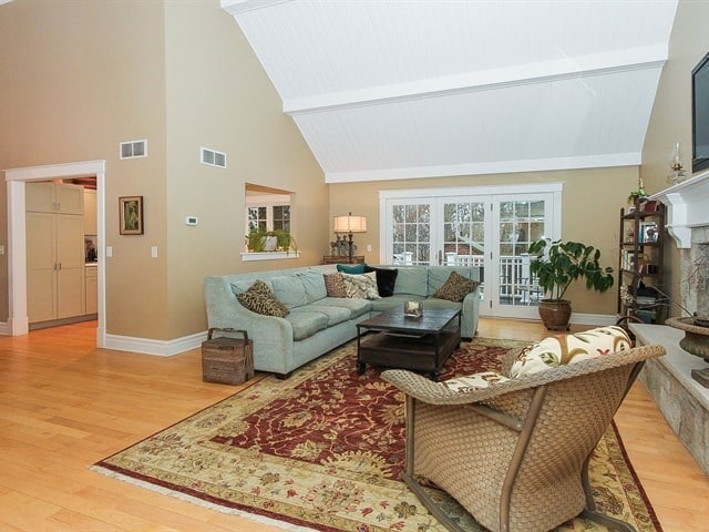 44W906 Berner Rd, Hampshire, IL 60140 - living area with light wood-type flooring, a fireplace, and visible vents