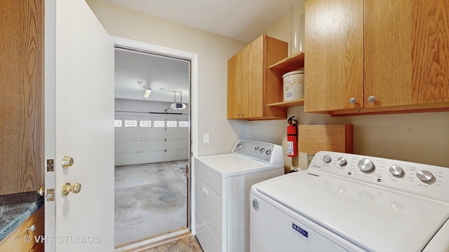 laundry area with cabinet space and washer and dryer