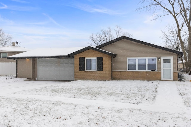 single story home with a garage