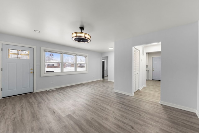 foyer entrance featuring light hardwood / wood-style floors