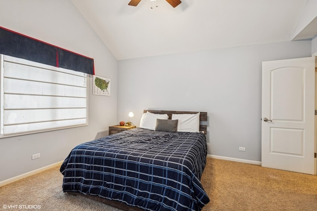 bedroom with lofted ceiling, carpet flooring, a ceiling fan, and baseboards