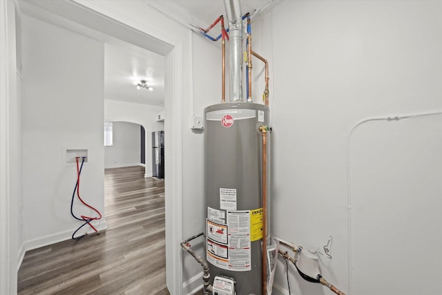 utility room with water heater