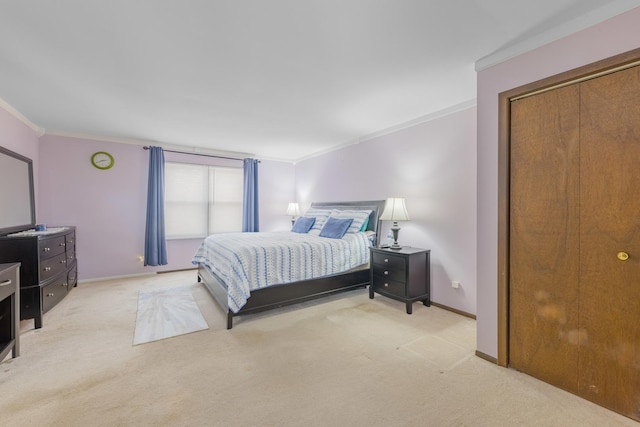 bedroom featuring ornamental molding, light carpet, and baseboards