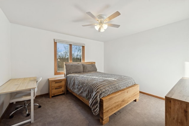 bedroom with ceiling fan and dark colored carpet