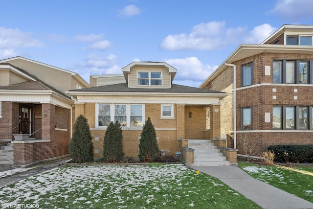 view of front of house with brick siding