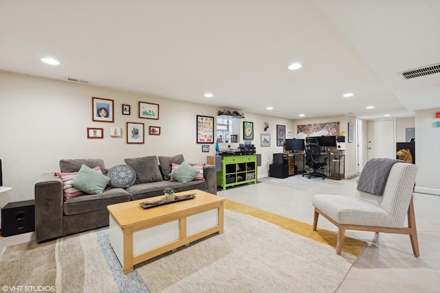 living room featuring light tile patterned floors, visible vents, and recessed lighting