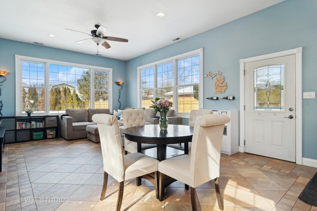 dining space featuring a ceiling fan, recessed lighting, a healthy amount of sunlight, and visible vents