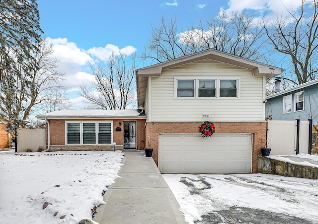 split level home featuring a garage