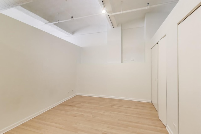 spacious closet with light wood-style flooring