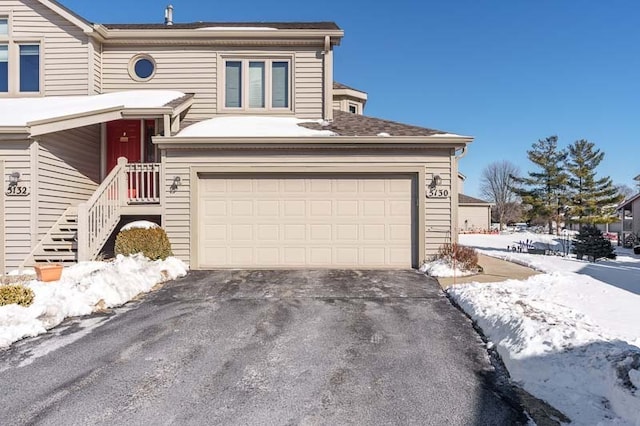 view of front of home featuring driveway and an attached garage