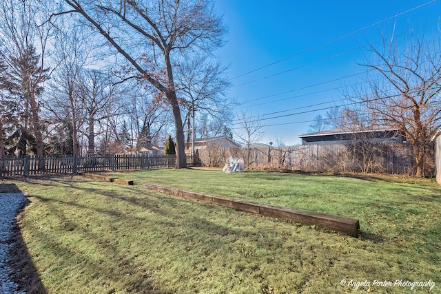 view of yard with fence