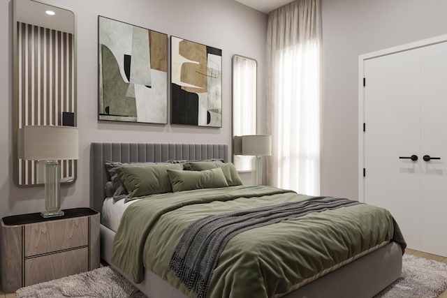 bedroom featuring a closet and hardwood / wood-style floors