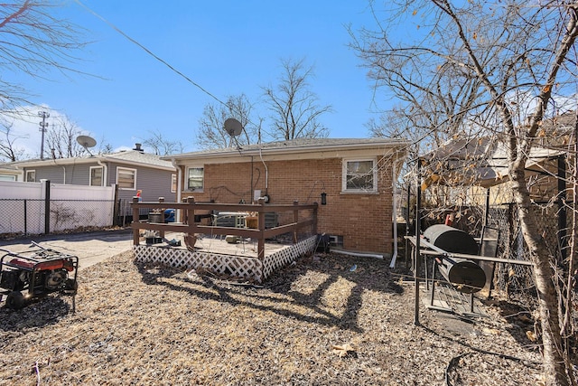 14817 Lexington Ave, Harvey, IL 60426 - rear view of property featuring brick siding, a deck, and fence