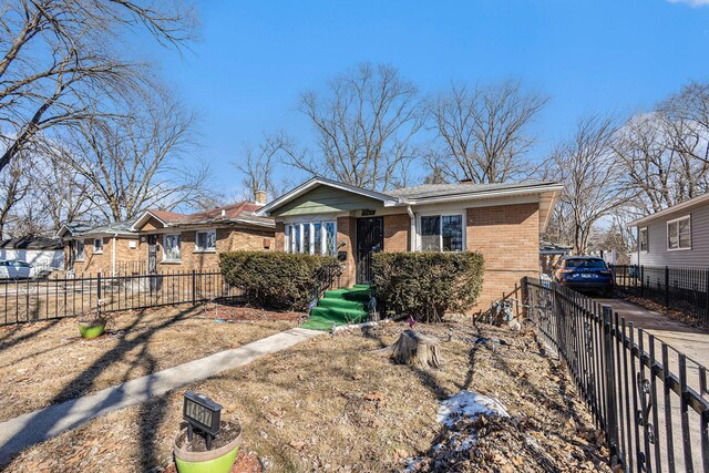 14817 Lexington Ave, Harvey, IL 60426 - bungalow-style house featuring fence and brick siding