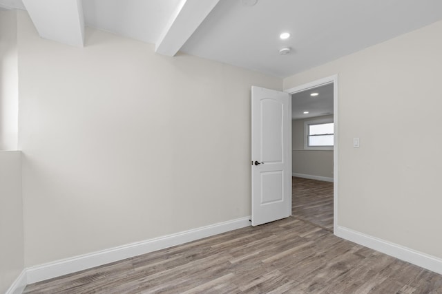 unfurnished room with light hardwood / wood-style floors