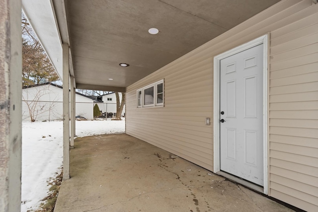 view of snow covered patio