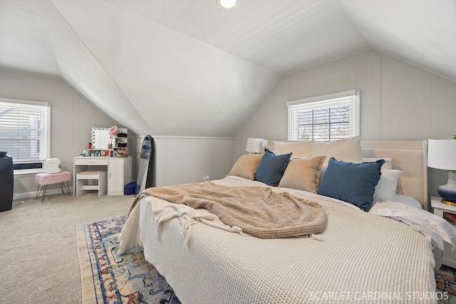 bedroom featuring vaulted ceiling and carpet flooring