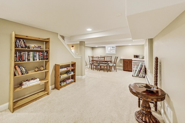 sitting room featuring baseboards, carpet flooring, and recessed lighting