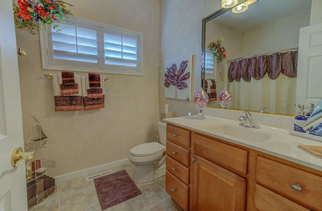 full bath featuring baseboards, visible vents, toilet, tile patterned floors, and vanity