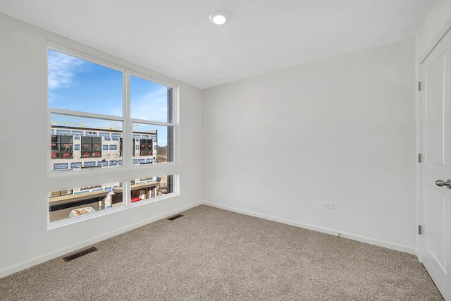 view of carpeted spare room