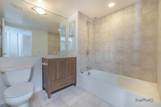 full bath featuring toilet, vanity, visible vents, shower / washtub combination, and tile patterned floors