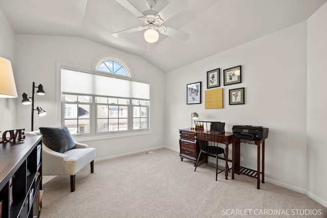 office featuring light carpet, lofted ceiling, a ceiling fan, and baseboards