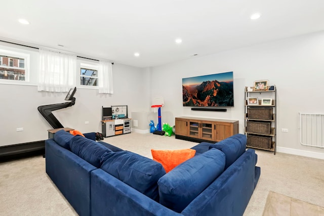 living area featuring light carpet, visible vents, baseboards, and recessed lighting