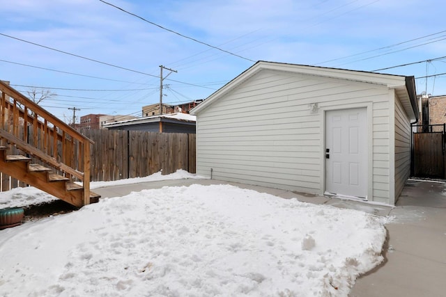 exterior space featuring fence and stairs