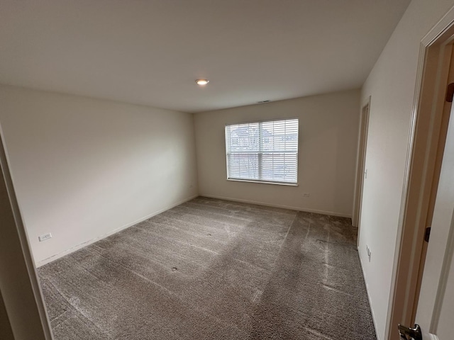 empty room featuring carpet