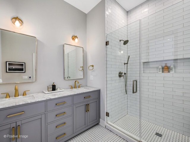 bathroom featuring vanity and an enclosed shower