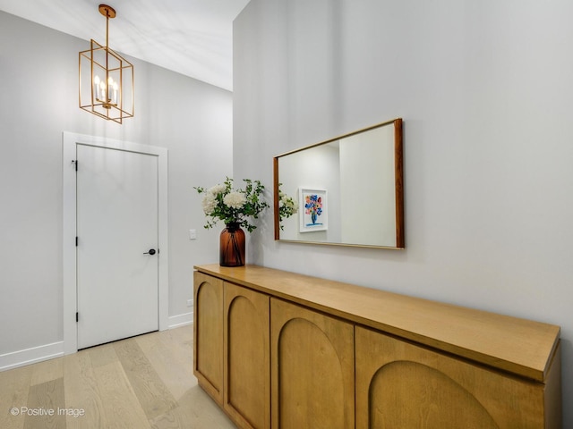 foyer entrance with light wood-type flooring