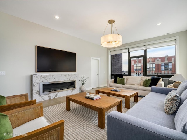 living room featuring a fireplace