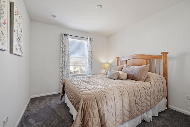 carpeted bedroom with baseboards