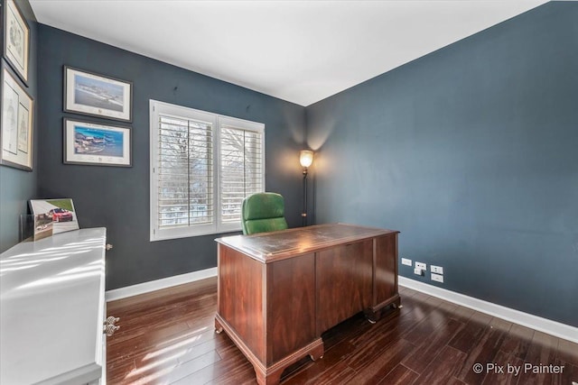 office space with dark wood-style floors and baseboards