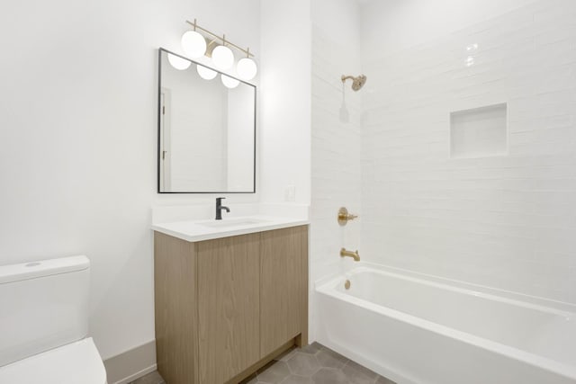 bathroom featuring shower / bathtub combination, vanity, toilet, and tile patterned floors