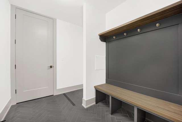 mudroom featuring baseboards