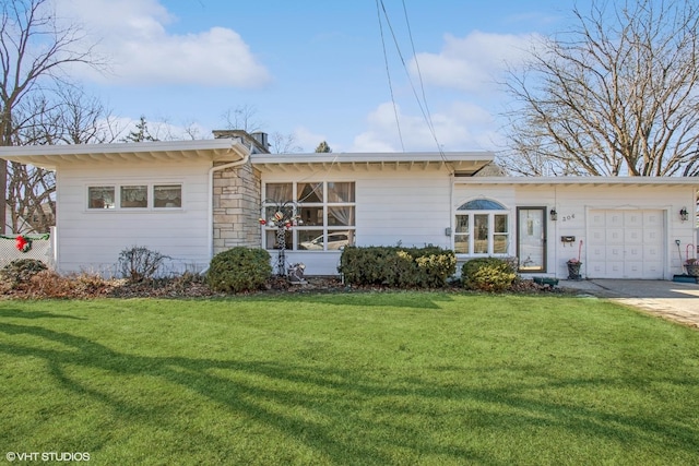 view of front facade with a garage, stone siding, concrete driveway, and a front lawn