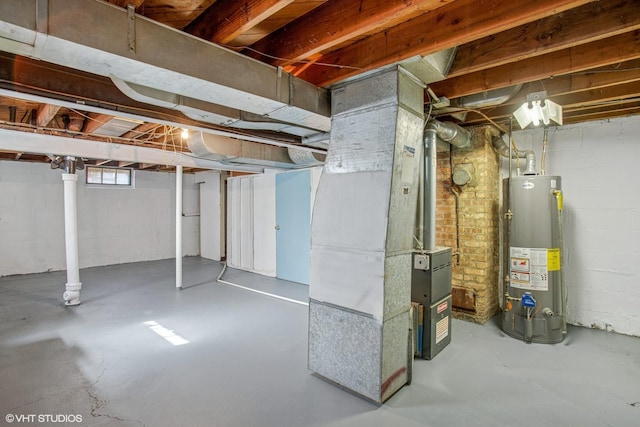 basement with gas water heater and heating unit