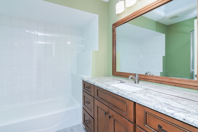 bathroom featuring shower / bathtub combination, visible vents, and vanity