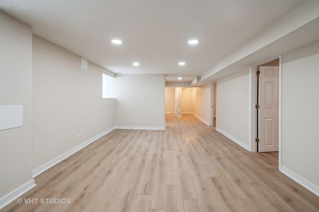 basement featuring light hardwood / wood-style flooring