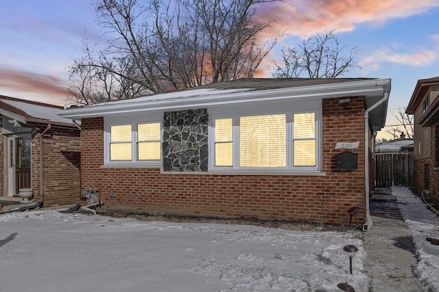 view of property exterior at dusk