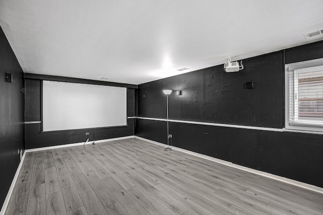 home theater featuring light wood-type flooring