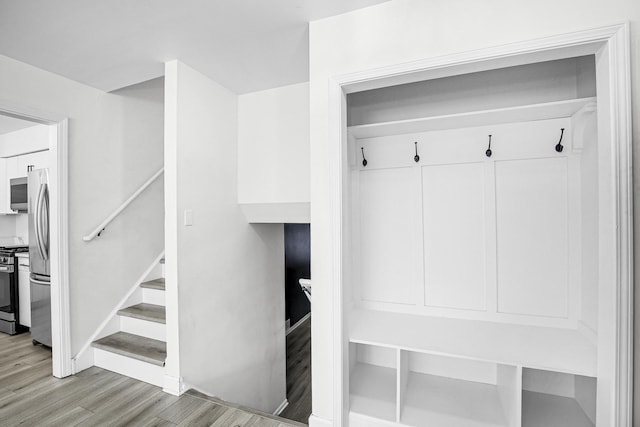 mudroom with light wood-type flooring